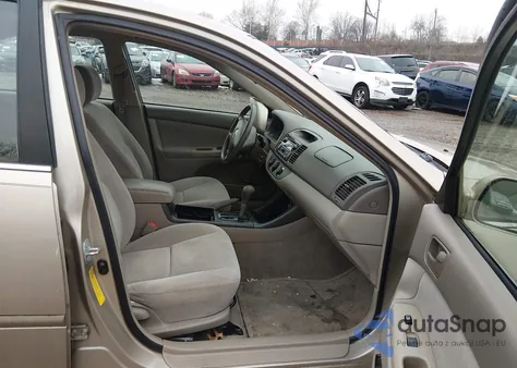 2003 Toyota Camry Le z USA, uszkodzony, nr VIN 4T1BE30KX3U231073